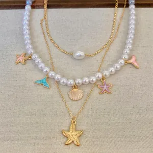 Elegant multi-layer pearl necklace set with ocean-themed starfish and shell charms