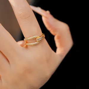 Close-up of 18k gold plated open ring with geometric hollow design and zircons