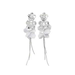 Elegant silver flower earrings with white petals and long tassels for a sweet look
