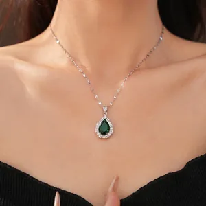 Elegant green pear-shaped zirconia necklace with sparkling crystal halo on silver chain