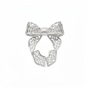 Elegant silver bow hollow open ring with sparkling stones in minimalist style