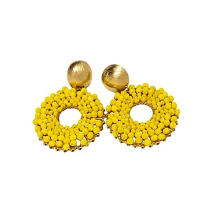 Vibrant yellow beaded bohemian round pendant stud earrings perfect for summer vacation