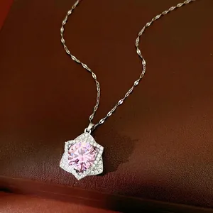 Sparkling star pendant necklace with large pink zircon on a delicate silver chain