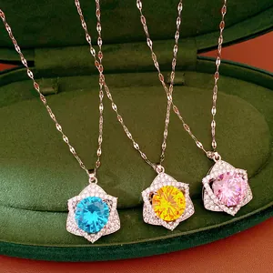 Macro detail showing star necklaces with blue, yellow and pink round zircon crystals