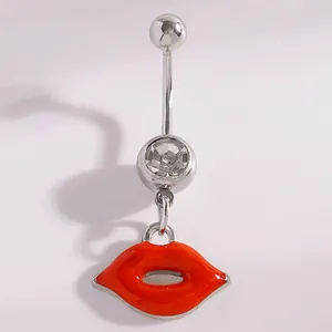 Detailed view of silver belly ring with red enamel lips pendant and clear crystal