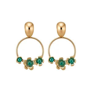Elegant gold hoop earrings featuring vintage green floral pendants in a luxury palace style