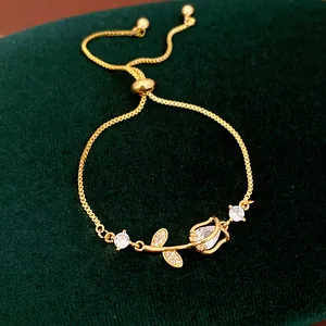 Detailed view of elegant zircon tulip bracelet with gold-plated adjustable bolo chain