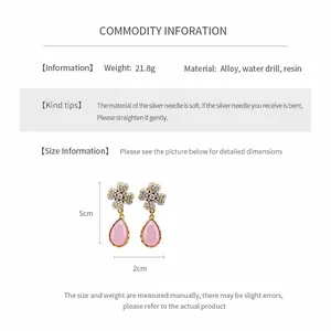 Detailed dimensions of pink resin teardrop earrings with rhinestone flower studs