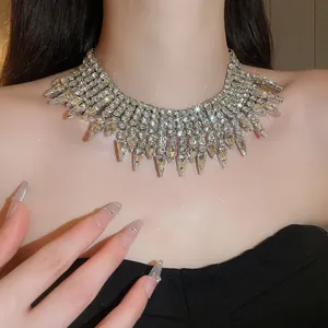 Macro view showing the sparkling rhinestones of this luxury water drop tassel necklace