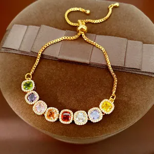 Close-up of colorful square zirconia adjustable bracelet on brown velvet display