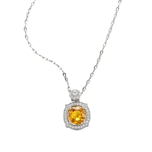 Elegant silver-tone necklace featuring a round yellow zircon in a square halo pendant