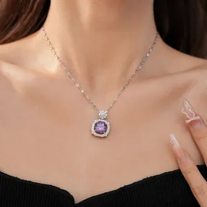 Detailed view of an elegant square purple zircon pendant necklace on a model's neck