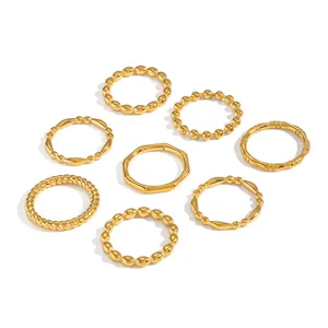 Set of 8 minimalist 18K gold-plated stainless steel rings with bamboo and twist designs