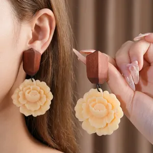 Vintage silver needle earrings with wood geometric top and carved beige resin flower