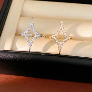 Detailed view of 18k gold plated star rings with sparkling cubic zirconia