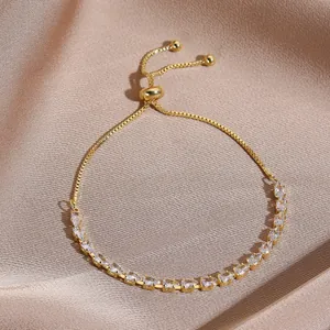 Close-up of golden adjustable slider bracelet with sparkling marquise-cut cubic zirconia stones