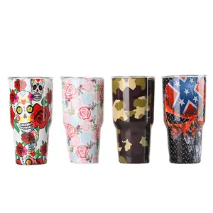 Insulated 30oz stainless steel tumblers with assorted floral and skull pattern designs