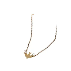 Minimalist gold-tone dove pendant necklace featuring a polished peace bird charm on a fine chain