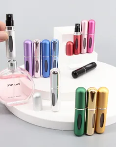 Detailed display of 5ml bottom-fill perfume atomizers in diverse metallic color finishes