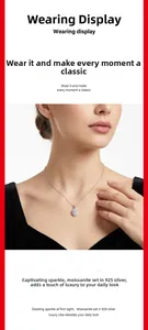 Gros plan du pendentif en moissanite étincelant porté sur une chaîne en argent massif