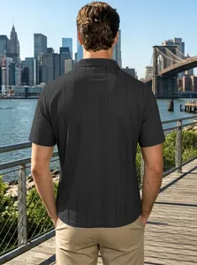 Detail of grey ribbed short sleeve polo shirt showing fabric texture and back view