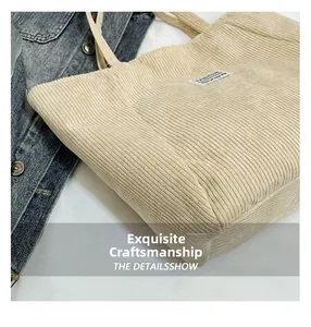 Detailed macro view of beige corduroy tote bag texture and white woven label accent