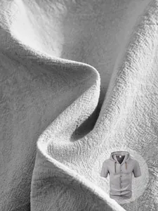 Detailed macro view of gray linen fabric texture on men's short sleeve hooded shirt