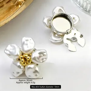 Detailed view of flower pearl cufflink with 30mm diameter and secure metal back clip