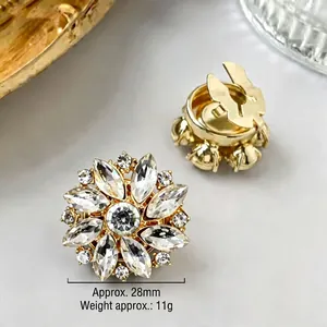 Detailed view of 28mm golden sunflower crystal brooch showing front and back texture