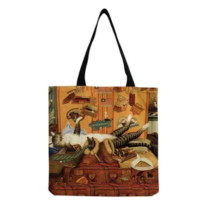 Detailed view of canvas tote bag featuring vintage cat and travel luggage art print