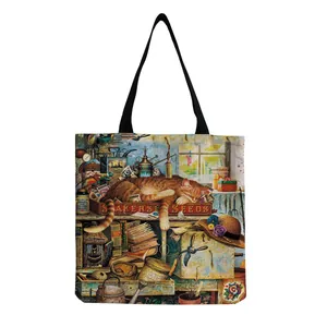 Detail of vintage garden scene with a sleeping orange cat printed on a canvas tote bag