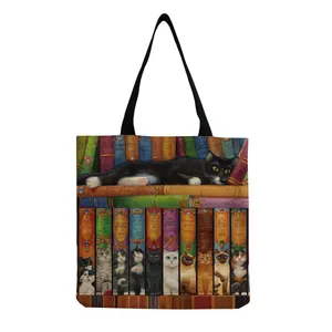 Close-up of fabric texture showing vintage cat bookstore illustration on shoulder bag