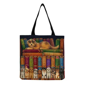 Close-up of cat on books and puppy portraits print on a canvas shopping bag