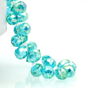 Macro detail of faceted cyan blue K9 crystal glass teardrop beads for jewelry making
