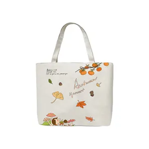 Minimalist white canvas tote bag with autumn harvest illustrations and nature theme