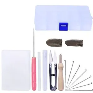 Detail view of DIY needle felting tool kit with foam mat, needles, and wooden handles