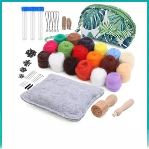 Detailed view of DIY needle felting kit with colorful wool yarn and essential hand tools