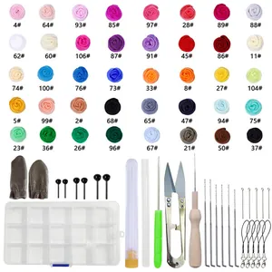 Close-up of 40-color wool roving DIY felt kit with essential needles and craft tools