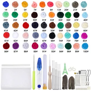 Detailed flat lay of 50 colors wool roving and complete DIY needle felting tool kit