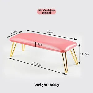 Detailed dimensions of a pink leather manicure arm rest with golden hairpin legs