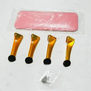 Pink leather nail armrest components with gold metal legs and mounting hardware kit