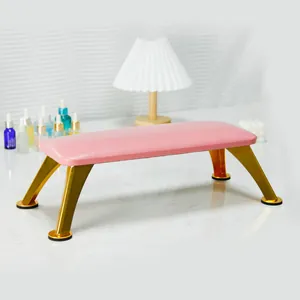 Pink PU leather nail arm rest with golden metal legs for professional manicure salons