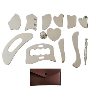 13-piece stainless steel gua sha tool set with massage roller and felt carrying pouch