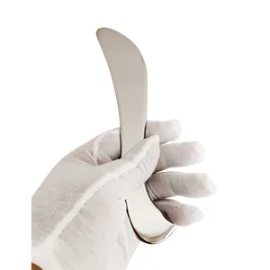 Close-up of heart-shaped 304 stainless steel guasha tool with high-gloss mirror finish