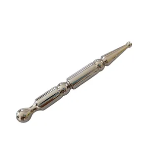 Detailed macro view of 304 stainless steel massage tool with smooth mirror finish