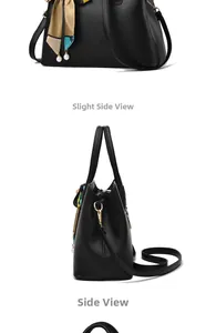 Detailed side view of black lychee leather handbag with silk scarf and pearl charms