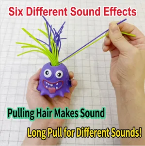 Purple monster stress relief toy with light, six sounds, and stretchy green hair
