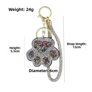 Detailed view of rhinestone bear paw keychain with measurements and gold-tone metal clasp