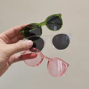 Kids round sunglasses set with transparent frames in green, clear and pink shades