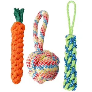 Three durable cotton dog rope toys including carrot and ball shapes for chewing and playing